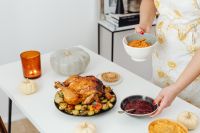 Kaboompics - Serving Glazed Carrots and Cranberry Sauce for Thanksgiving