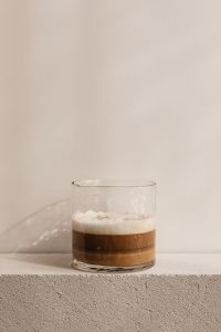 Kaboompics - Overhead Latte Foam with Two Crema Spots on Concrete Texture