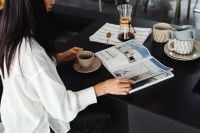 Kaboompics - Coffee Break with Magazine on a Kitchen Stool