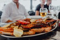 Kaboompics - Restaurant Seafood Platter with Blurred Diners