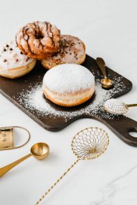 Kaboompics - Homemade Raspberry Polish Paczki Donut with Powdered Sugar