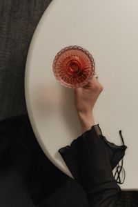 Kaboompics - Red Cocktail Glass on a White Table from Above