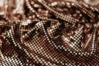Kaboompics - Rose Gold Sequin Netting in Diagonal Folds, Macro Metallic Texture Background