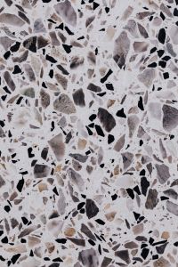 Kaboompics - Pale Gray Terrazzo Texture with Black and Charcoal Stone Fragments