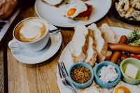 Kaboompics - Cappuccino with Toast, Sausages and Breakfast Condiments