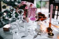 Kaboompics - Pink Beads and Glass Decanters on an Elegant Holiday Table
