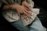 Kaboompics - Close Up of Woman Holding Cash Money Aesthetic