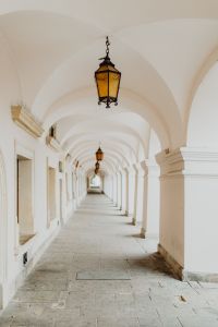 Kaboompics - White Arched Passageway with Hanging Lantern
