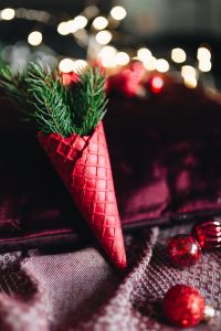 Kaboompics - Red Woven Cone Christmas Ornament with Spruce and Burgundy Bokeh