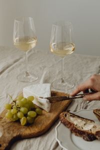 Rustic Bread, Butter, Camembert, Olives, and White Wine Lunch