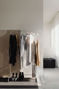 Kaboompics - Full Clothing Rack with Silver, Gold and Black Party Outfits