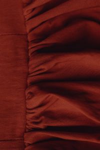 Kaboompics - Burgundy Fabric With Deep Sculptural Draping