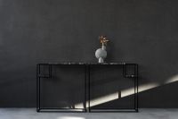 Kaboompics - Dark Modern Console Tables with Dried Flower Vase and Sunlit Charcoal Wall