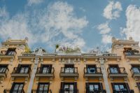 Kaboompics - Madrid Rooftop Terrace with Potted Plants Above an Ornate Facade