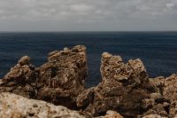 Kaboompics - Open Mediterranean Sea Framed by Jagged Limestone Cliffs