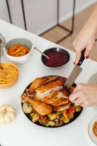 Kaboompics - Vertical Close-Up of Carving a Thanksgiving Roast