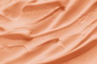 Kaboompics - Peach Fabric Flowing Texture