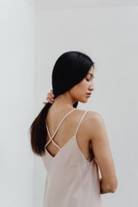 Kaboompics - Back View of Asian Fashion Model in Pale Slip Dress with Crossed Straps