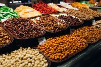 Kaboompics - Dried Fruit and Snack Baskets at La Boqueria, Barcelona