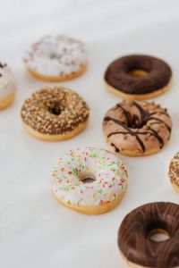 Kaboompics - Various donuts on white marble