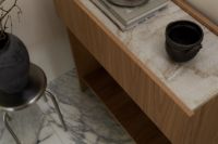 Kaboompics - Japandi Interior Detail with Black Ceramic Vessel and Marble Console