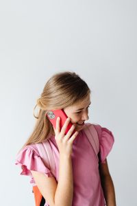 Kaboompics - Close Up of Young Woman on Smartphone