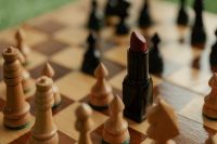 Kaboompics - Red Lipstick on Chessboard