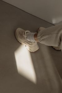 Kaboompics - Minimalist Sneaker Fashion in Warm Natural Light
