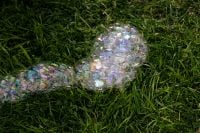 Kaboompics - Dense Iridescent Bubble Texture on Fresh Green Grass