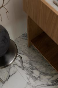 Kaboompics - Minimalist Interior Detail with Black Ceramic Vase and Wooden Console
