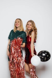 Kaboompics - Two Women With Balloons and Metallic Fringe