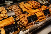 Kaboompics - Spanish Tapas Counter with Savory Pastries and Skewers