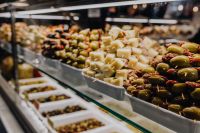 Kaboompics - Market Counter with Olives, Pickles and Cheese Cubes