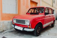 Kaboompics - An old red Renault 4 car parked on the street in Izola, Slovenia
