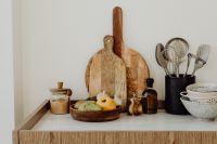Kaboompics - Wide Neutral Kitchen Counter Background with Cooking Utensils, Wooden Boards and Pantry Ingredients, Copy Space