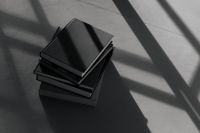 Kaboompics - Dark Moody Reading Aesthetic with Black Hardcover Books