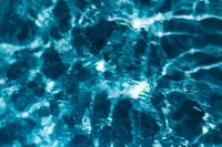 Kaboompics - Wavy water surface in a swimming pool