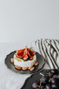 Camembert Cheese Board with Figs, Grapes, Almonds and Rosemary