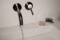 Kaboompics - Minimal Bathroom Sink Faucet and Soap Dish in Hard Flash