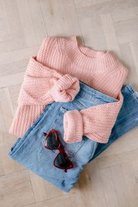 Flat lay collage - women's modern casual outfit, pink sweater, jeans, sunglasses