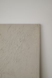 Kaboompics - Textured Neutral Plaster Panel Against White Wall – Fujifilm X100VI