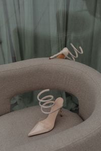 Kaboompics - Clear Strappy Heels on a Curved Accent Chair