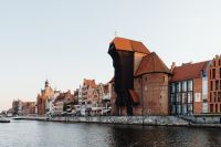 Kaboompics - Gdańsk Medieval Port Crane over the Motława River and Historic Old Town Waterfront