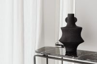 Kaboompics - Black Vase On Marble Console With Mirror