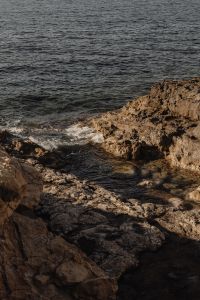 Kaboompics - Rocky Coastal Inlet with White Sea Foam