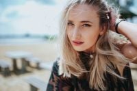 Kaboompics - Blonde Woman Beach Portrait with Hand in Her Hair