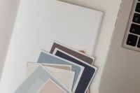 Kaboompics - Paint Color Palette With Glasses and Laptop on Work Desk