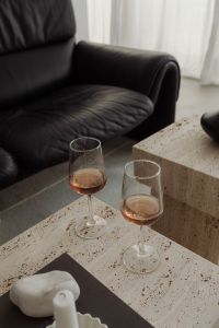 Kaboompics - Travertine Side Table with Black Bowl and Dried Stems