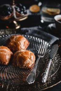 Kaboompics - Sweet Buns with Coffee and Pastries in Soft Focus