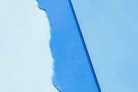 Kaboompics - Bright Blue Paper with Torn Darker Blue Edge